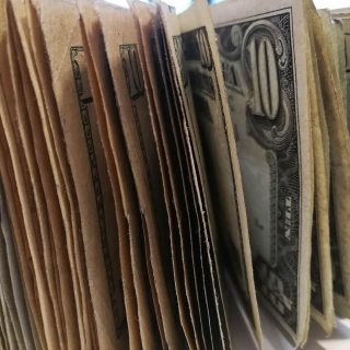 multiple ten dollar bills